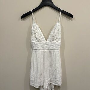 White romper ties in back